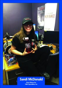 Winner Sandi McDonald of SUNY New Paltz won a water bottle, an insulated mug, and a ball cap from H & H Specialties.